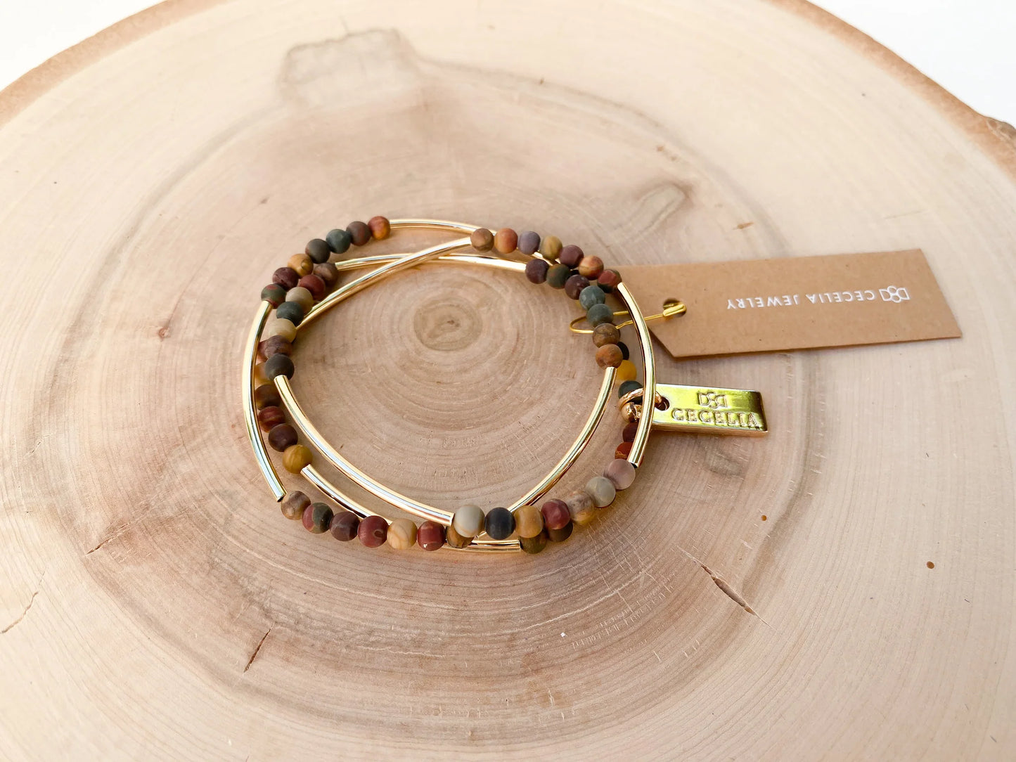 Bracelet triple tour en pierres précieuses nuancées et plaqué or