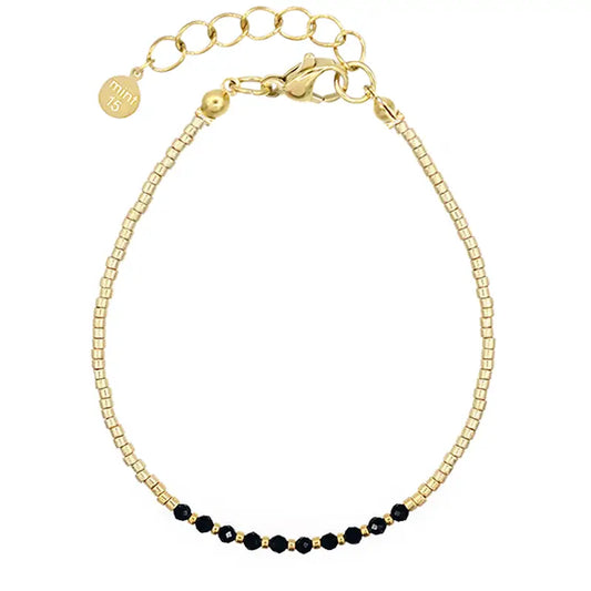 Bracelet en perles dorées et noires