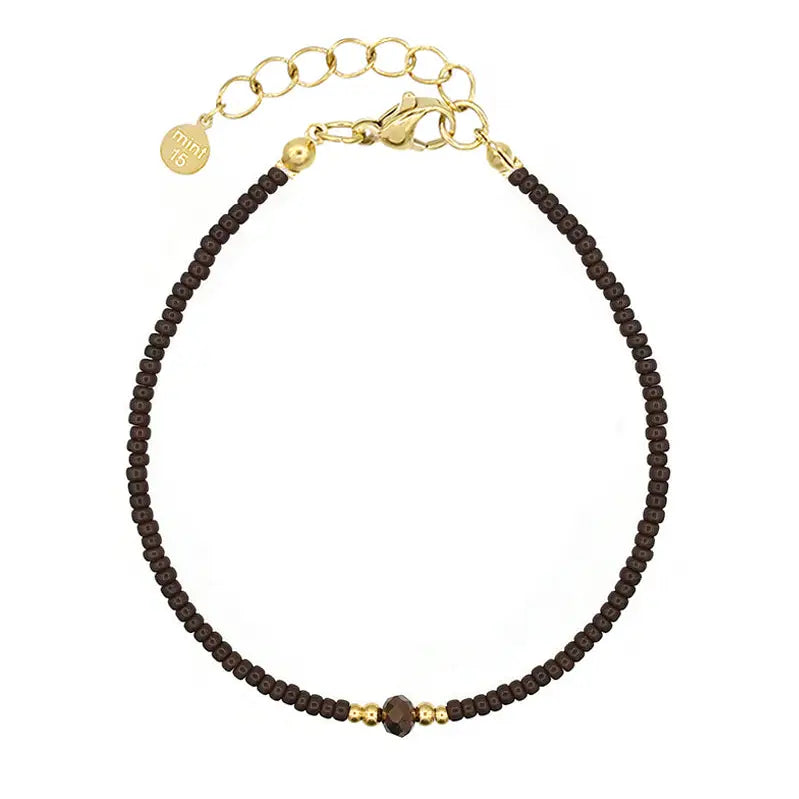 Bracelet en perles dorées et marrons