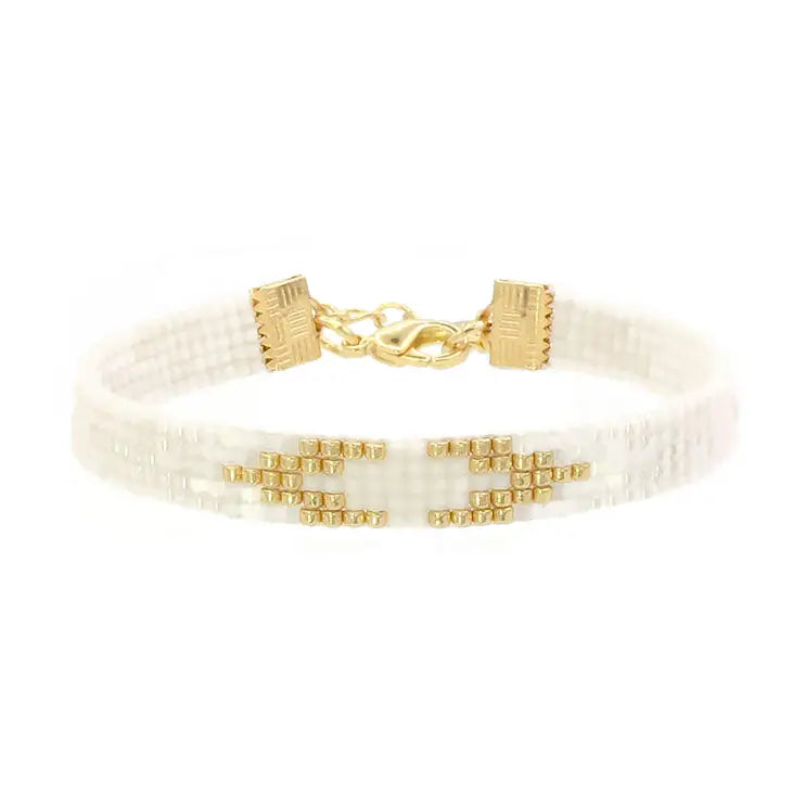 Bracelet tissé blanc et doré